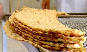 پس از مهاجرت 1.5 میلیون افغان، چرا نان سنگک ارزان نشد؟